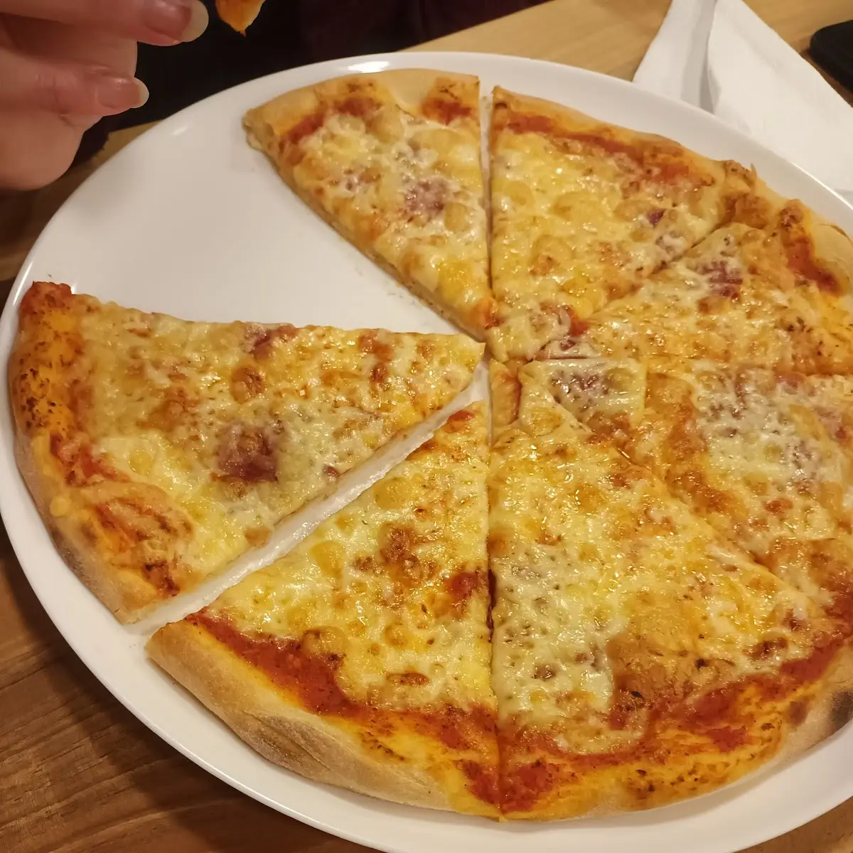 Pizza Margarita, Zum Oz