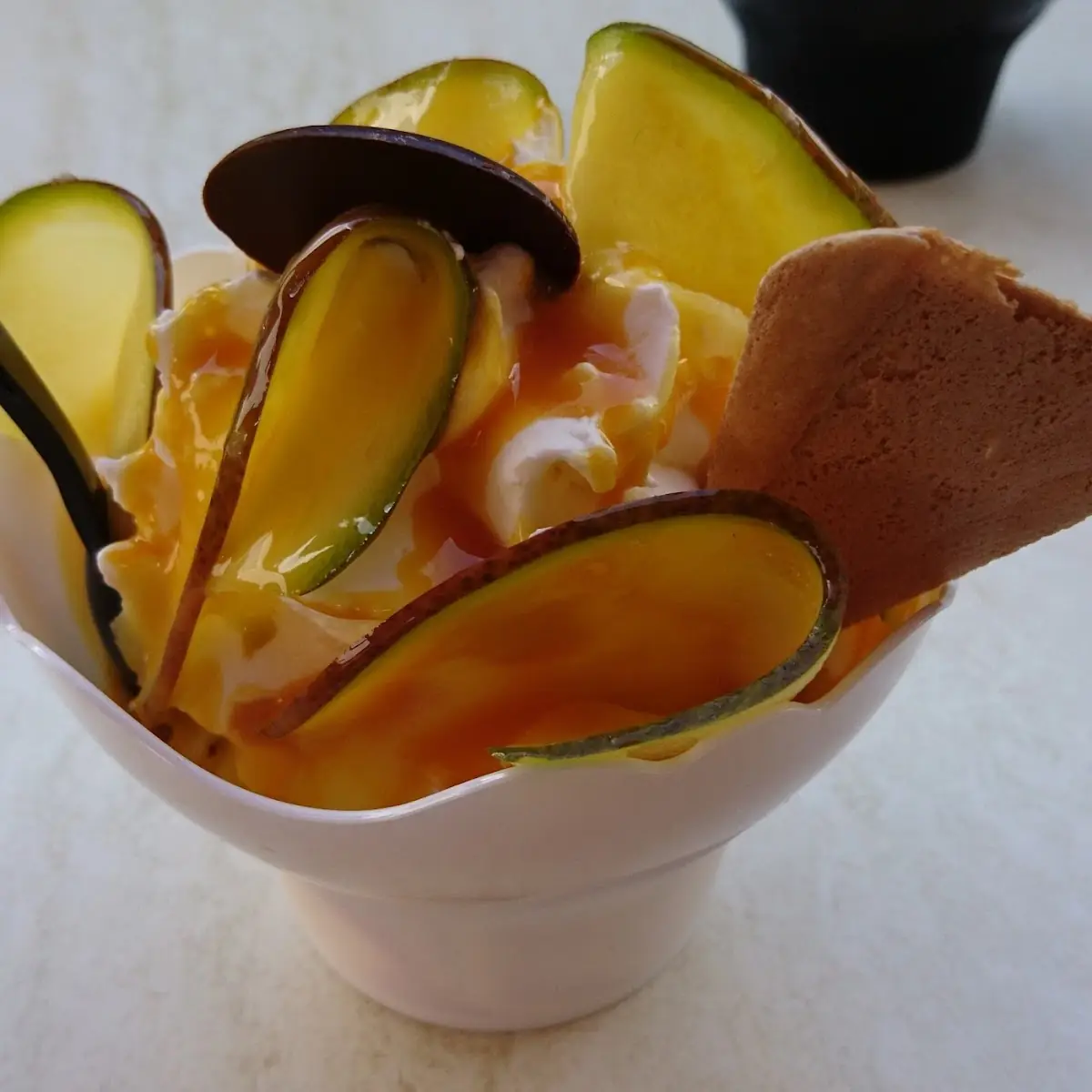 Mango Becher